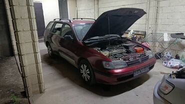 авто из америки: Toyota Carina E универсал, левый руль. Цвет: темно‑бордовый