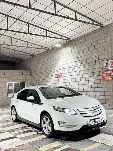byd e2 2025: Chevrolet Volt: 2014 г., 1.4 л, Автомат, Гибрид, Хэтчбэк — 1