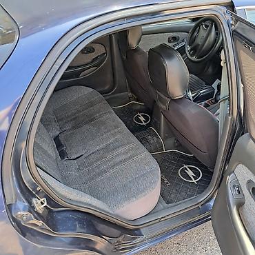 Kia: Kia Clarus: 2 l | 1997 il Sedan — 11