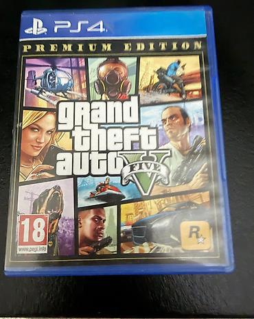 Видеоигры и приставки: Grand Theft Auto V — Premium Edition для PS4 (диск в коробке). - — 1