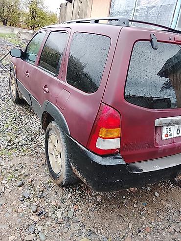 тиков: Mazda Tribute: 2003 г., 3 л, Автомат, Бензин, Кроссовер — 1