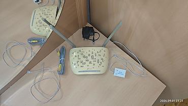 printer 3 u birində: TP-Link simsiz Wi‑Fi router Xüsusiyyətlər: - İki ədəd xarici antena – — 1