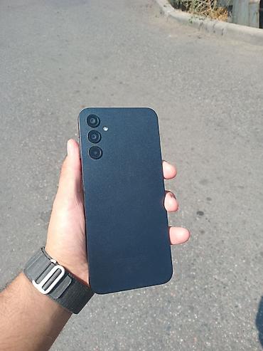 note 14: Samsung Galaxy A14, Б/у, 64 ГБ, цвет - Черный, 2 SIM, eSIM — 1