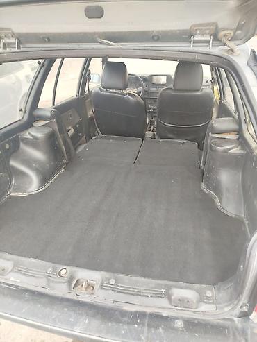 Mazda 323: 1990 г., Механика, Бензин, Универсал