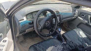 форт грзовой: Mazda 323: 2002 г., 1.6 л, Механика, Бензин, Хэтчбэк — 5