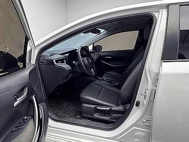 coroll: Toyota Corolla: 2023 г., 1.8 л, Гибрид — 2