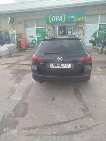 baqaji: Opel Astra: 1.4 l | 2011 il 310000 km Universal — 4