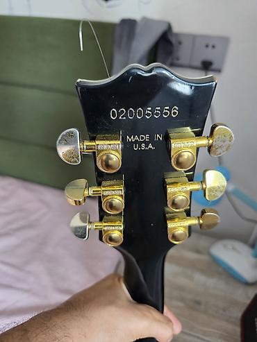 gitara capo: Gibson Les paul Black Beauty. Epiphone pickuplardır. Grover tunerləri — 2