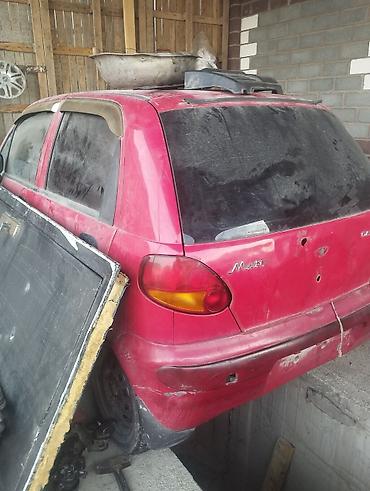 Daewoo: Daewoo Matiz (хэтчбек), бордовый цвет, левый руль. Компактный — 5