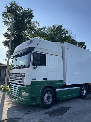 Тягач DAF XF год 2012 свежий пригнан SCHMITZ год 2007 TERMO-KING