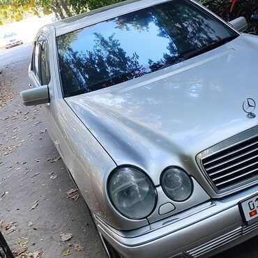 Транспорт: Mercedes-Benz E 200: 2 л | 1996 г. | Седан