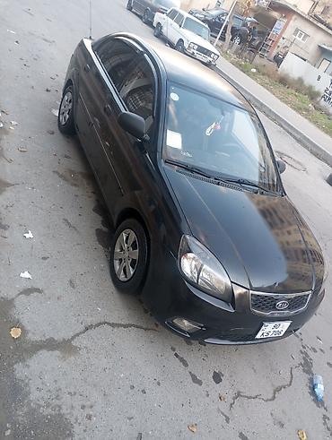 yan güzgülər s: Kia Rio: 1.4 l | 2010 il Sedan — 7