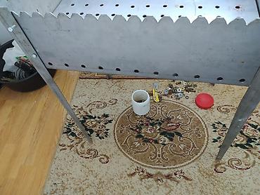 piknik seti: Paslanmayan poladdan sökülüb yığılan manqal və şiş dəsti - Material — 4
