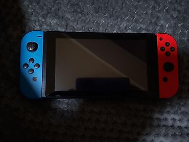 oled smart tv: Nintendo Switch konzola sa originalnim Joy-Con kontrolerima u — 1