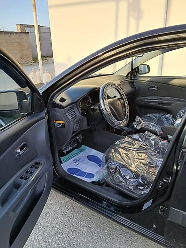 авто азербайджан: Kia Rio CRDi, qara rəng, hetçbek .maşin arxa sağ qapıdan başqa — 1