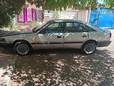 a4 b7: Isuzu Aska: 1990 г., Механика, Бензин, Лифтбек — 8