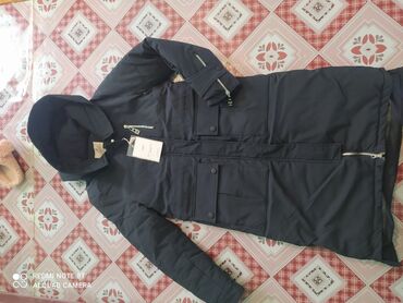 сколько стоит куртка the north face: Пуховик, L (EU 40)