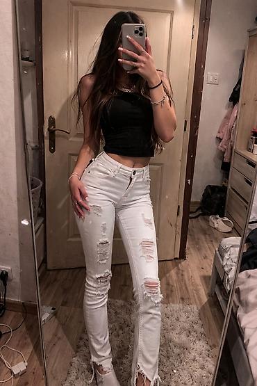 ps baletanke: Beli ženski skinny farmerki sa pocepanim detaljima - Model — 3