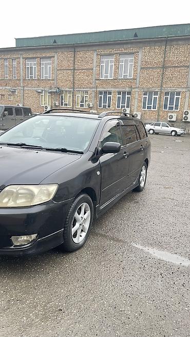 Toyota: Toyota Corolla: 2005 г., 1.8 л, Автомат, Бензин, Универсал — 7