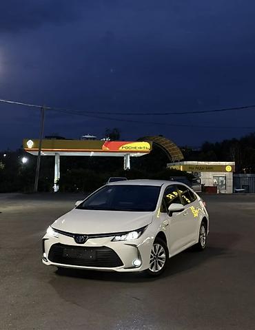 voxy noah: Toyota Corolla: 2021 г., 1.8 л, Вариатор, Гибрид, Седан — 1