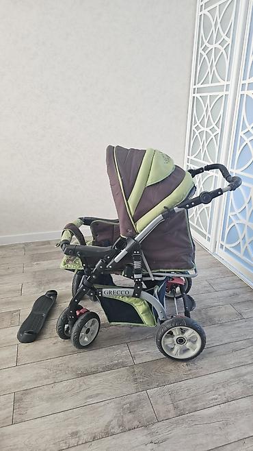 gəzinti arabaları: Uşaq arabası – GRECCO marka, yaşıl-qəhvəyi rəng. Xüsusiyyətlər: - — 1