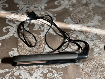 Zərərvericilərə qarşı mübarizə aparatları: Ütü fen Remington, 10 - 230 °C