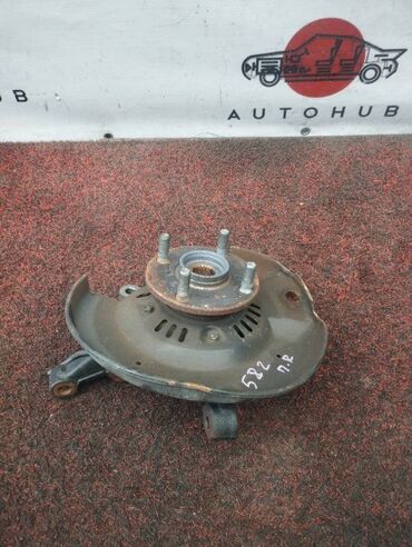 Коробки передач: Цапфа Toyota Raum NCZ20 1NZ-FE 2006 перед. прав. (б/у)