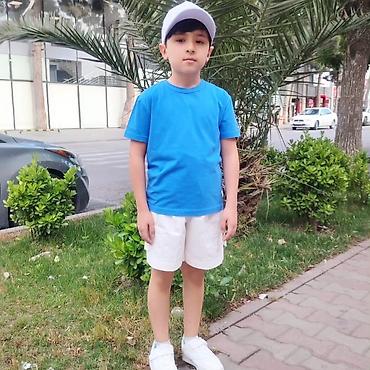 Комплекты одежды: Rengli T-shirt 👕 rəngli kepka 
rəngli futbolka 
3-14 yaş — 2