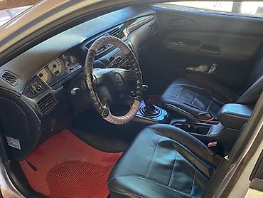мото каракол: Mitsubishi Lancer: 2006 г., 1.3 л, Седан — 2