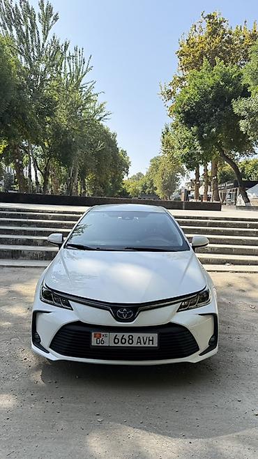 машина гибрид марки: Toyota Corolla: 2019 г., 1.8 л, Вариатор, Гибрид, Седан — 4