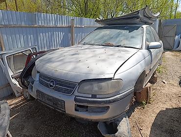 другой: Opel Omega B, серебристый седан — разбор по запчастям Доступны — 3