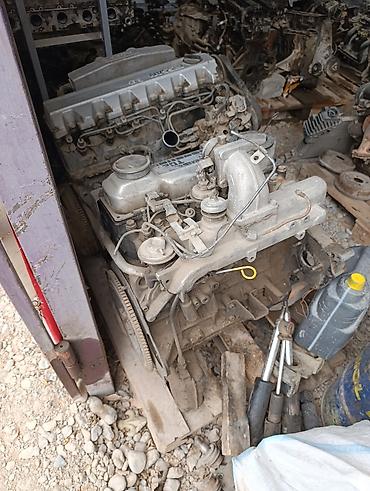 компрессоо: Двигатель Nissan Diesel TD27 (турбодизель) - Тип: рядный — 3