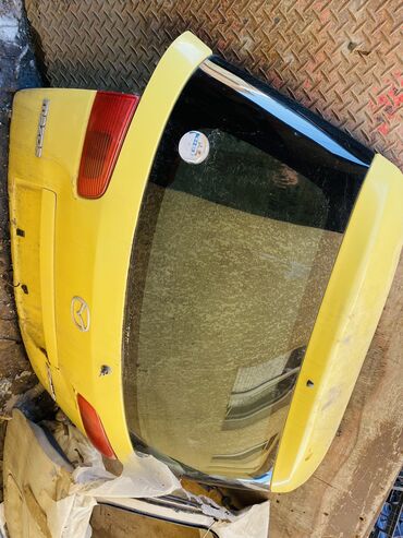 багажники нексия: Крышка багажника Mazda 2003 г., Б/у, цвет - Желтый,Оригинал