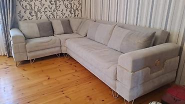 Künc divan açılır baza var. Satılır 450₼. Ünvan Xocasən &Rumi