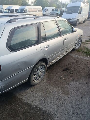 ящик в багажник: Nissan Primera: 2001 г.
