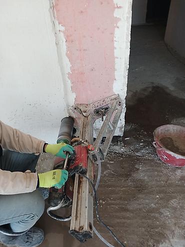 Digər tikinti xidmətləri: Dəmir-beton və kərpic divarlarda qapı-pəncərə açılışlarının kəsilməsi — 17