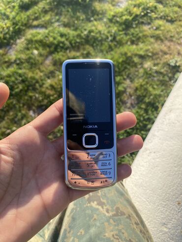 telefonlarin alisi: Nokia 6300 4G, rəng - Boz, Düyməli