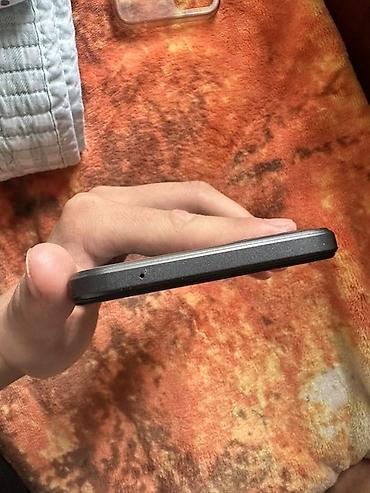 Мобильные телефоны и аксессуары: Смартфон T-Mobile pro 5G (брендированный логотипом T) в черном цвете — 3