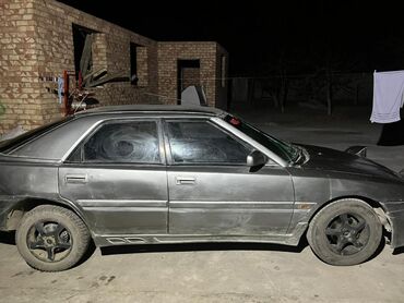 Mazda: Mazda 323: 1989 г., 1.6 л, Механика, Бензин, Седан — 2