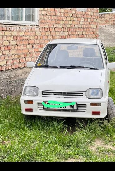 насос авто: Daihatsu Cuore: 1991 г., 0.8 л, Механика, Бензин, Купе
