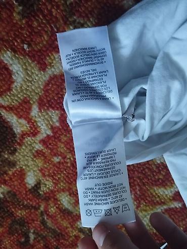 Футболки: Футболка Ellesse, белая, с крупным фирменным логотипом на груди — 3