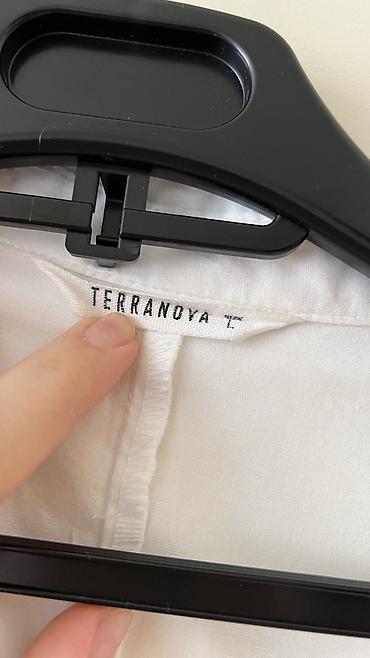 Ziyafət donları: - Məhsul: Oversize T‑shirt - Brend/Qrafika: “NEW ERA” mövzulu çap; ön — 10