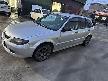 Mazda: Mazda 323: 2003 г., 1.3 л, Механика, Бензин, Универсал — 11