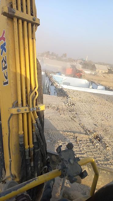 Услуги экскаватора: Услуги экскаватора — 9