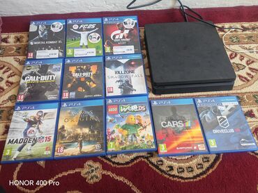 кир жугуч: Игровой комплект PlayStation 4 Slim с двумя геймпадами и подборкой