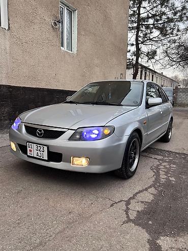 Mazda: Mazda 323: 2003 г., 1.6 л, Бензин — 1