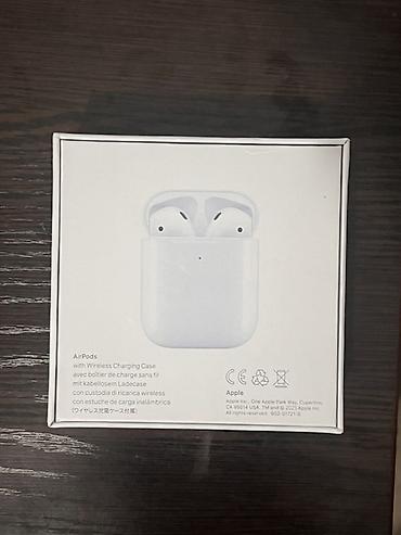 Аксессуары для мобильных телефонов: Apple AirPods with Wireless Charging Case (модель A2031/A2032, кейс — 2