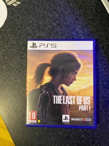 ps5 oyun diski: Last of us part 1 ps5 üçün yenilənmiş versiya əla vəziyyətdədi türkcə