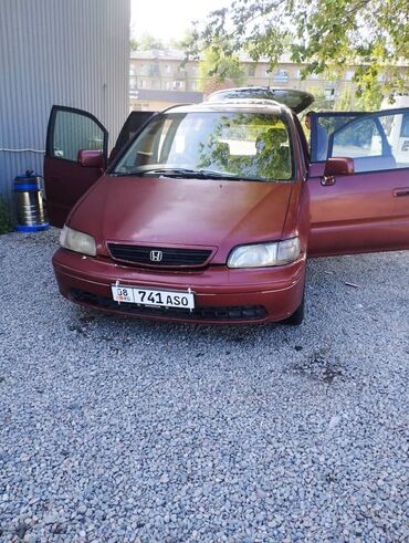 машина нива 44: Продается минивэн Honda Odyssey в бордовом цвете. Автомобиль имеет