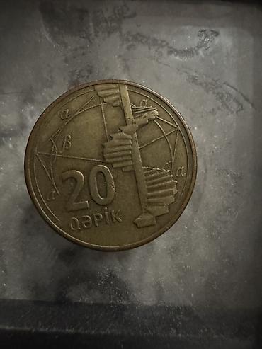 Монеты: -Лира - доллары - ОАЭ: 1 дирхам (надписи на арабском и английском — 6